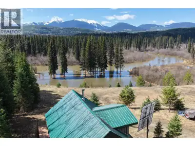 Nestled along a stunning stretch of the Bowron River, this 5-acre private property is what you've be...
