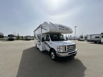 Thor Motor Coach Four Winds Class C gas motorhome 22E highlights: Queen Bed Cab Over Bunk 40in.in. T...