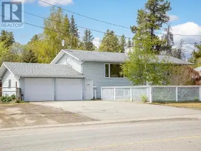 Affordable Porter Creek family home with 24'x24' attached garage and plenty of additional parking. T...