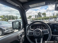 Embark on unparalleled adventures with this striking Black 2025 Jeep Wrangler Sahara Convertible. Th... (image 8)