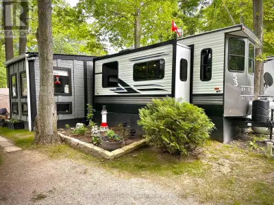 Located in the desirable Sandy Acres Park, this spacious 4-season mobile home offers comfortable yea...