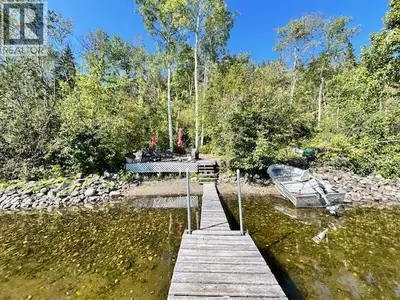 Great southern exposure property. Includes 3 bedroom cabin with a great view of the lake from the fu...