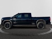 Welcome to Capital GMC! This 2026 GMC Sierra 3500HD AT4 Capital Custom Lift Truck in Onyx Black is e... (image 1)