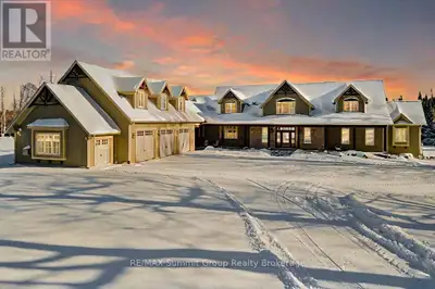This extraordinary estate blends timeless charm & modern comfort on 21.68 acres of scenic beauty. Wh...