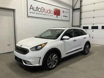 Le Kia Niro 2017 SX TOURING CUIR TOIT MAGS CAMERA RECUL CRUISE offert chez AutoStudio 72 à Mirabel e...