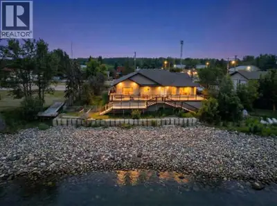 A cottage in Joussard, Alberta, inviting you to enjoy a year-round lakefront lifestyle. This 2009-bu...