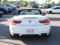 Experience exhilarating performance, open-air luxury, and unmistakable BMW M engineering with this 2... (image 4)