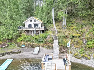 Rarely available ROAD ACCESS - FREEHOLD property. Escape to your lakeside haven on the pristine shor...