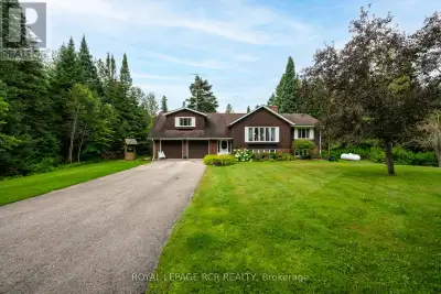 Welcome to this rare opportunity to own a beautiful 2.01 acre property just five minutes from downto...
