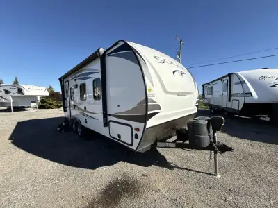 Palomino SolAire Ultra Lite travel trailer 205SS highlights: Queen Bed Rear Corner Bath Sofa with a...