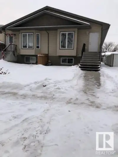 Half duplex register as a condominium, no condo fee, no condo documents. $315,000 buys you this fant...