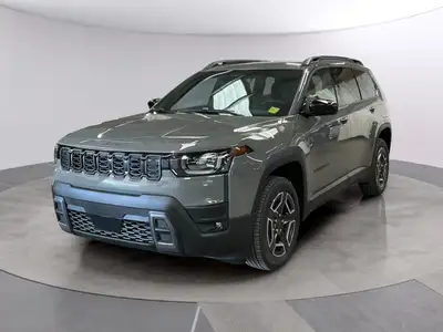 Experience the perfect blend of style and capability with the 2026 Jeep Cherokee Laredo 4x4, draped...