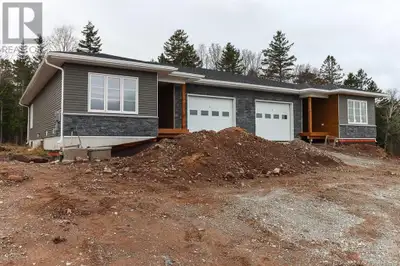 To Be Built- Similar to 16/18 Elmwood. Welcome to this brand-new construction garden home in the cha...