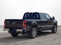 This Ford Super Duty F-350 SRW boasts a Intercooled Turbo Diesel V-8 6.7 L/406 engine powering this... (image 5)
