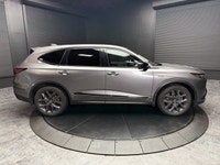 Discover the unmatched sophistication and all-weather capability of the 2023 Acura MDX A-Spec, elega... (image 1)