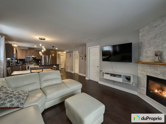 $394,999 - Condominium for sale in Laval-des-Rapides — photo 1