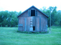 Wood granary with tin roof