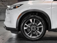 The 2023 INFINITI QX60 LUXE is a premium three-row SUV that balances family utility with high-end Ja... (image 7)