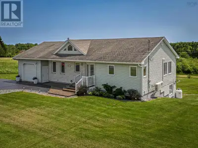 Elegant Country Property in Kennetcook. Entering the home through the spacious foyer brings you into...