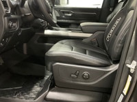 Meet the 2026 Ram 1500 Rebel 4x4 Crew Cab 57 Box: a commanding presence in a refined gray shade. Bui... (image 9)