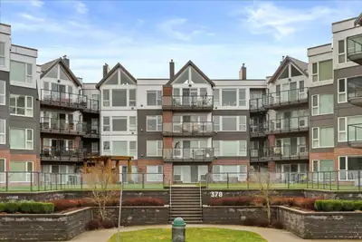 Step into this condo and be instantly captivated by the stunning, unobstructed views of Harrison Lak...