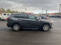 The 2023 Toyota RAV4 LE AWD in a stunning gray finish combines proficient AWD handling with a versat... (image 4)