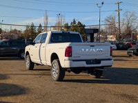 The 2026 Ram 3500 Laramie Crew Cab in Bright White combines heavy-duty capability with premium comfo... (image 3)