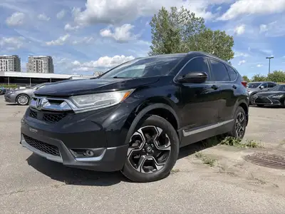 Le Honda CR-V Touring 2018 est un VUS compact haut de gamme reconnu pour sa fiabilité, son confort e...