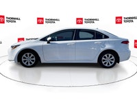 Thornhill Toyota Proudly Presents This White 2025 Toyota Corolla with LE CVT Package, Featuring an O... (image 4)