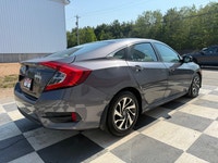 A modern compact sedan with upgraded convenience features, efficient performance, and a comfortable... (image 3)
