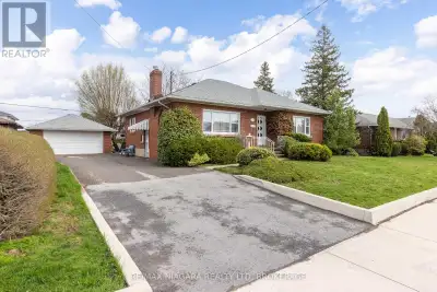 Tucked away on a quiet, established street, this classic 1,493 sq ft double-brick bungalow with 3 be...