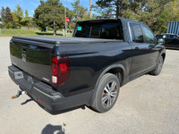 WAS: $30995 NOW: $28988 plus taxes and licensing feesRare & Practical! 2018 Honda Ridgeline EX-L – C... (image 3)