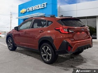 Get ready to elevate every journey with this vibrant 2024 Subaru Crosstrek Touring, finished in Sun... (image 2)
