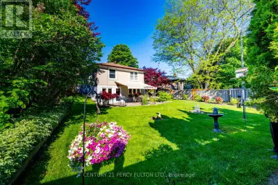 JUST MOVE IN! A meticulously maintained, move-in ready home situated in one of the most desirable an...