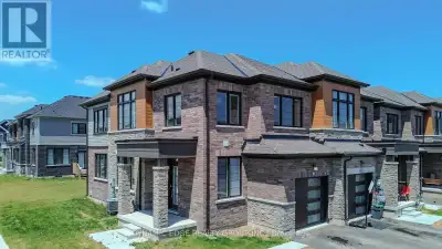 Welcome to 29 Lavendor Road a stunning preminum corner lot, end-unit townhouse located in the desira...