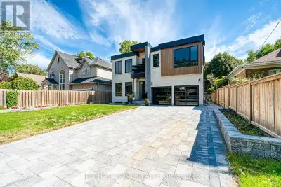 Wow, Modern custom-built residence, nestled in the scenic Bluffs and designed with timeless elegance...