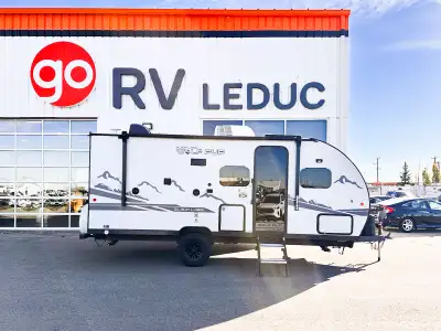 Lightweight and versatile 2022 Wolf Pup 18TOBL travel trailer, perfect for couples or small families...
