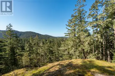 Welcome to Nighthawk Lane—an opportunity to own 6.84 acres of pristine West coast wilderness. Nestle...