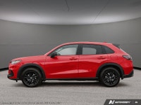 Get behind the wheel of the vibrant red 2027 Honda HR-V Sport AWD, engineered for all-weather condit... (image 2)