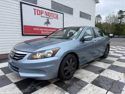 A reliable midsize sedan with a comfortable interior, smooth performance, and practical convenience...