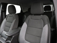 The 2021 Chevrolet Trailblazer, captivating in striking white with a sleek grey-dark interior. This... (image 6)