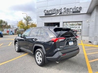 Looking for an SUV that blends style, reliability, and all-weather capability? The Black 2023 Toyota... (image 3)