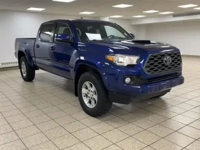 Introducing the 2022 Toyota Tacoma TRD Sport, a robust and stylish pickup truck that combines advanc...
