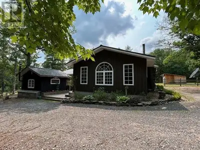 Discover this stunning off-grid retreat, perfect for year-round living or a seasonal escape. Located...