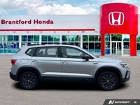 Experience agile performance and intelligent design in this 2024 Volkswagen Taos Trendline, presente... (image 6)