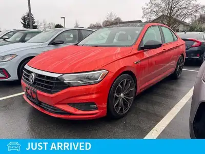 The 2019 Volkswagen Jetta Highline, presented in eye-catching Habanero Orange Metallic with a sophis...