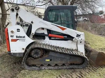 Cab with heat and air ;Condition : Good Hours : 2835 hrs Fuel Type : Diesel 2014 Bobcat T750