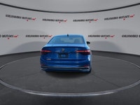 This Volkswagen Jetta has a powerful Turbo Gas 4cyl 1.5L engine powering this Automatic transmission... (image 6)