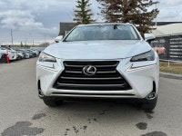 The NX 200t is characterized by its aggressive "spindle" grille and sharp, angular body lines. As th... (image 3)