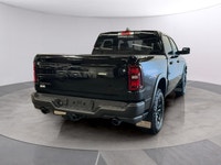 Experience the 2027 Ram 1500 Rebel in stunning black with robust 44 capabilities. This new truck del... (image 4)